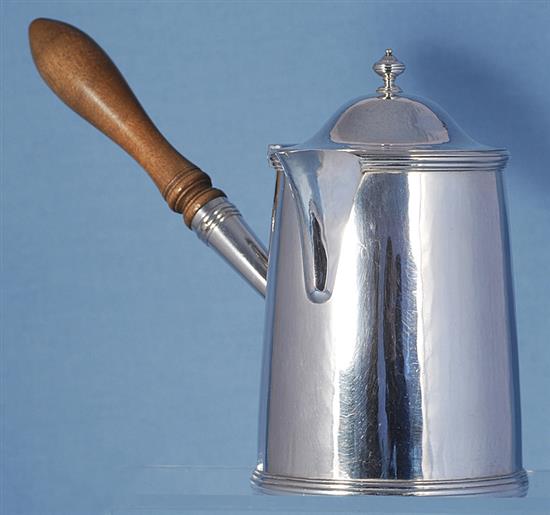 A George V Arts & Crafts silver hot milk jug, by Henry George Murphy, height 163mm, gross weight 15.4oz/481grms.